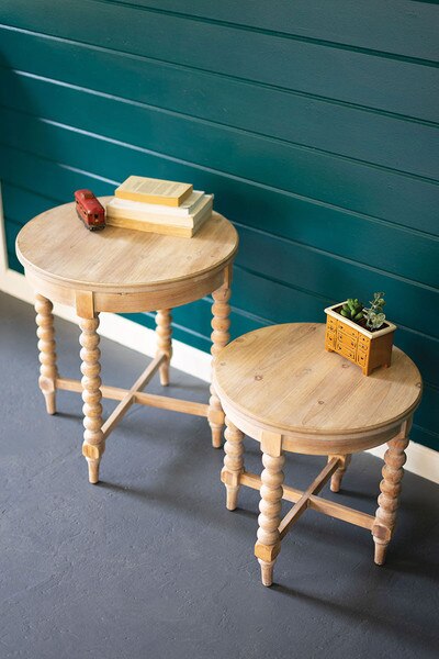 set of two round wooden side tables with turned legs
