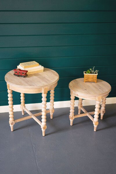 set of two round wooden side tables with turned legs