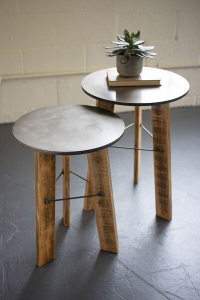 set of two round nesting side tables with metal top and recycled wood legs