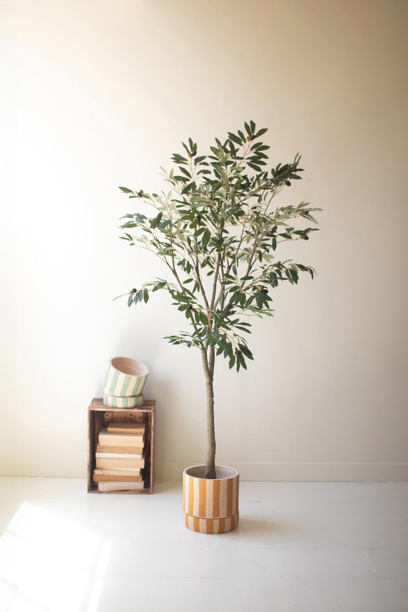 tall artificial olive tree in a black plastic pot