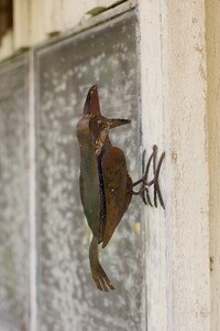 rustic metal woodpecker