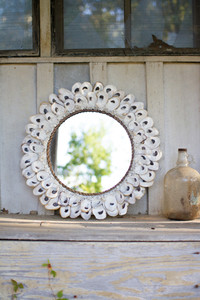 large round oyster mirror